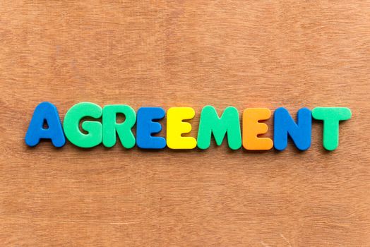 agreement colorful word on the wooden background