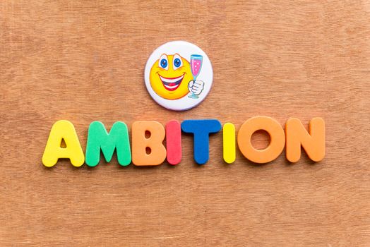 ambition colorful word on the wooden background