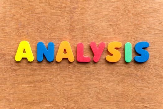 analysis colorful word on the wooden background