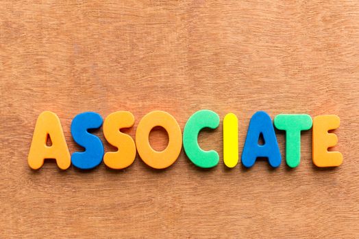 associate colorful word on the wooden background