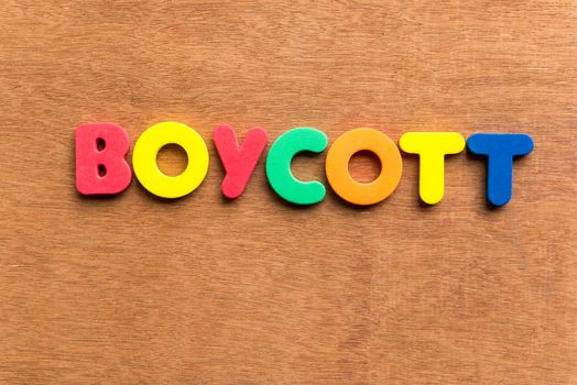 boycott colorful word on the wooden background