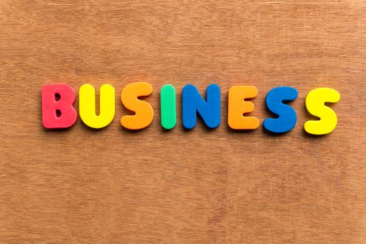 business colorful word on the wooden background