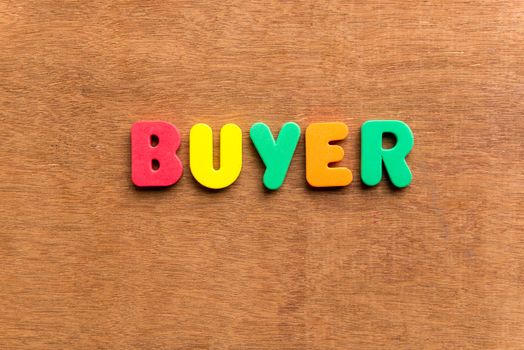 buyer colorful word on the wooden background