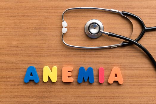 anemia colorful word on the wooden background