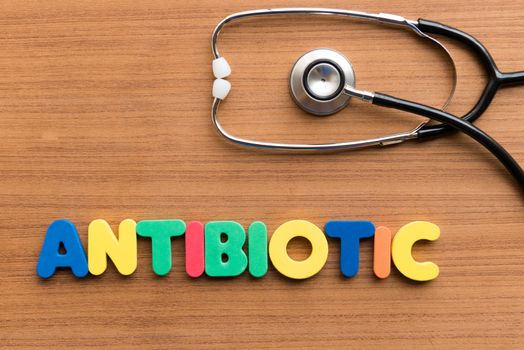 antibiotic colorful word on the wooden background