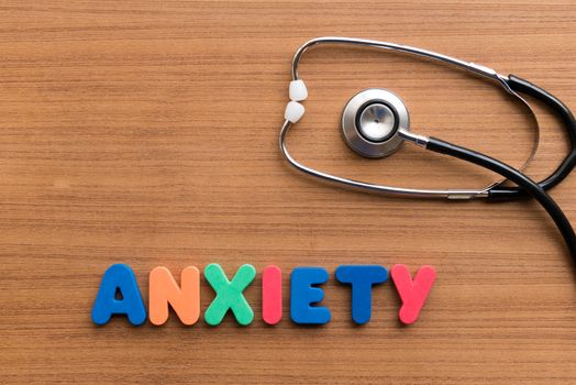 anxiety colorful word on the wooden background