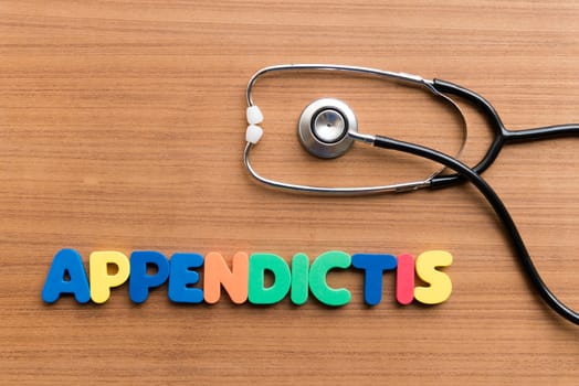 appendictis colorful word on the wooden background