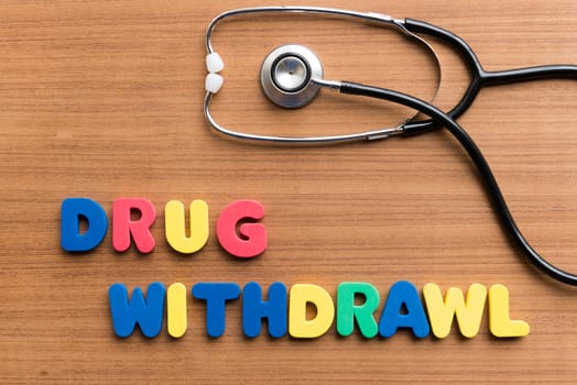 drug withdrawl colorful word on the wooden background