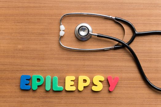 epilepsy colorful word on the wooden background