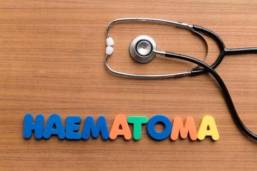 haematoma colorful word on the wooden background