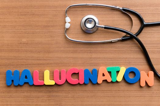 hallucination colorful word on the wooden background