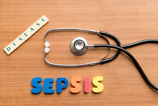colorful sepsis word on the wooden background