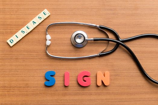 sign colorful word on the wooden background