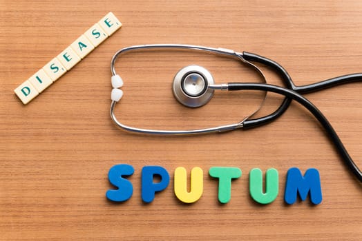 sputum colorful word on the wooden background
