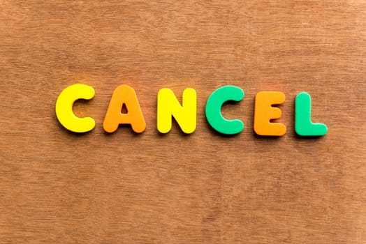 cancel colorful word on the wooden background