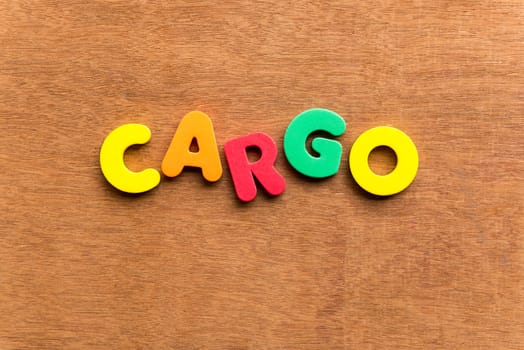 cargo colorful word on the wooden background