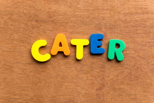 cater colorful word on the wooden background