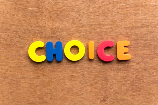 choice colorful word on the wooden background
