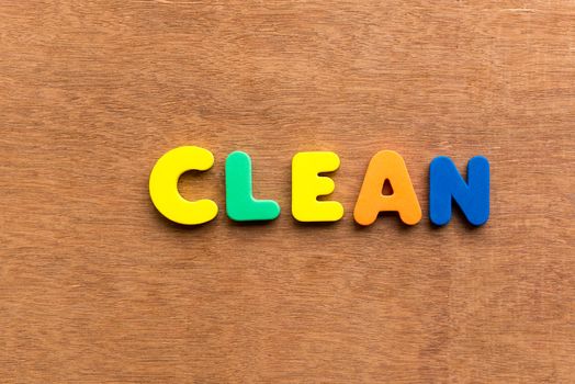 clean colorful word on the wooden background