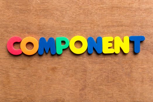 component colorful word on the wooden background