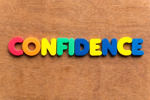 confidence colorful word on the wooden background