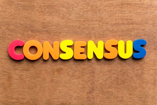 consensus colorful word on the wooden background