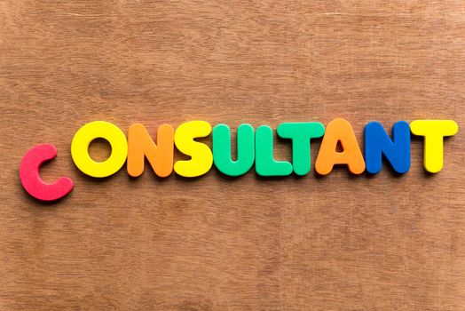 consultant colorful word on the wooden background