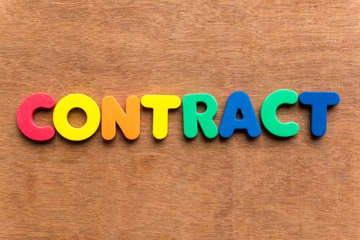 contract colorful word on the wooden background