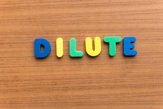 dilute colorful word on the wooden background