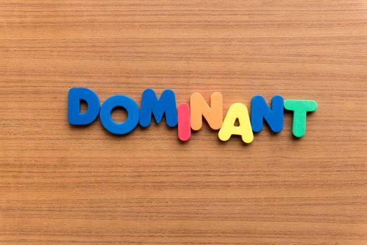 dominant colorful word on the wooden background