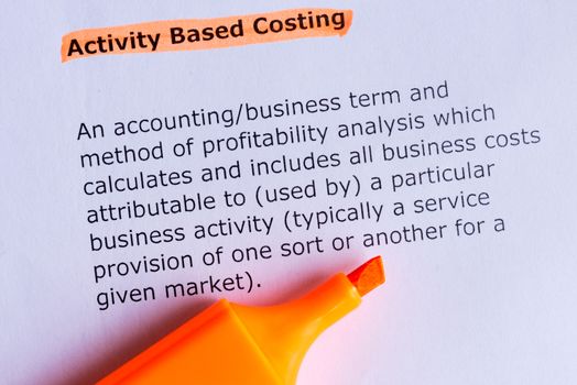activity based costing word highlighted on the white paper