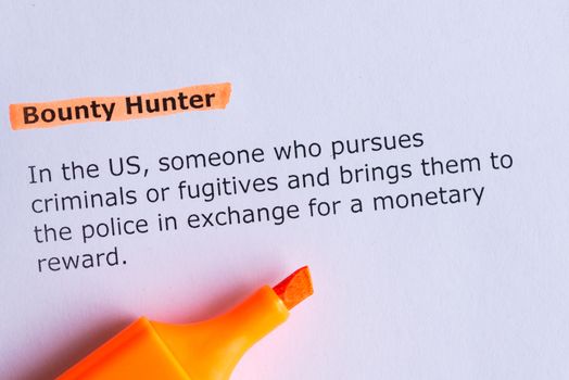 bounty hunter word highlighted on the white paper