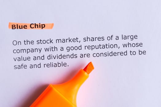 blue chip word highlighted on the white paper