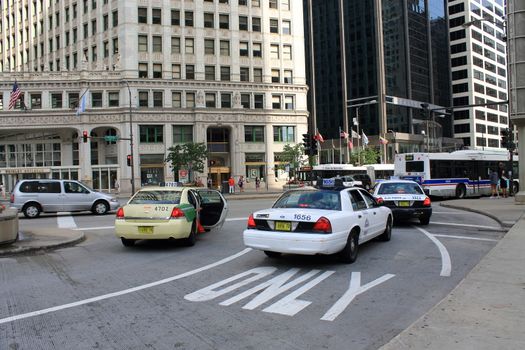 Taxi cabs on busy Michigan Avenue in Chicago.