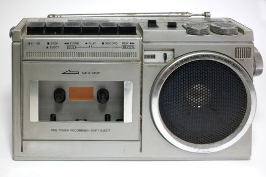 Retro blaster cassette tape recorder isolated on white background