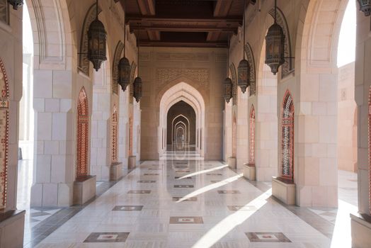 Muscat, Oman - February 28, 2016: Archway at Sultan Qaboos Grand Mosque in Muscat, Oman. This is the largest and most decorated mosque in this mostly Muslim country.