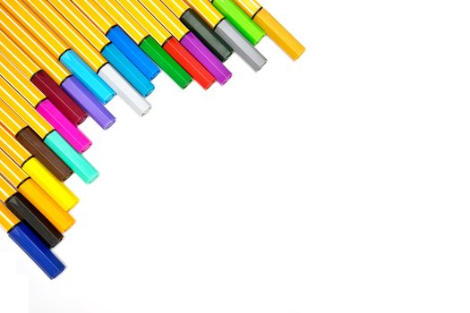 Colorful pens on isolated white background