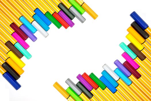 Colorful pens on isolated white background