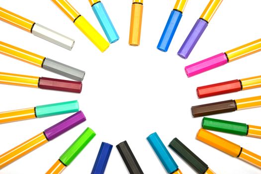 Colorful pens on isolated white background