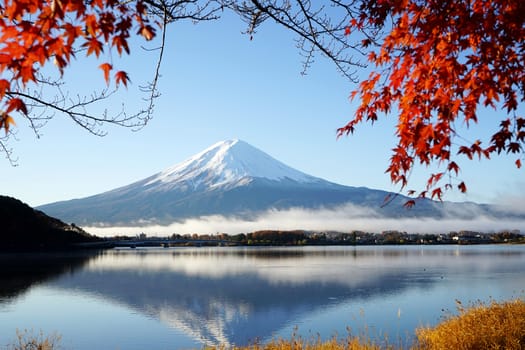 Mountain Fuji Kawaguchiko lake Japan with red maple leaf