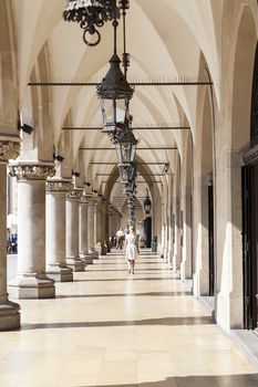 KRAKOW; POLAND - JUNE 26; 2016.Cloth Hall on Main Market Square in sunny day. Krakow Cloth Hall dates  to the Renaissance  is one of the city's most recognizable place. It is listed as a UNESCO World Heritage Site since 1978.