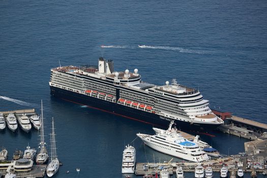 Monte-Carlo, Monaco - June 1, 2016: Aerial View of MS Eurodam Signature Cruise Ship (Holland America Line) and others Luxury Yachts in Port Hercule in Monaco