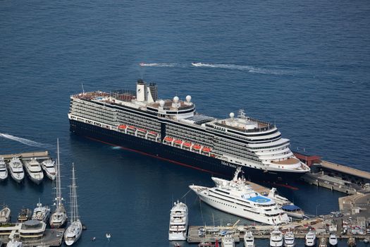 Monte-Carlo, Monaco - June 1, 2016: Aerial View of MS Eurodam Signature Cruise Ship (Holland America Line) and others Luxury Yachts in Port Hercule in Monaco