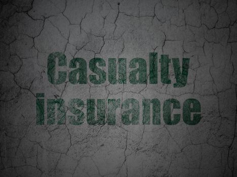 Insurance concept: Green Casualty Insurance on grunge textured concrete wall background