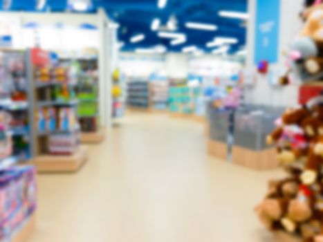 Blurred of kids toy store background with bokhe