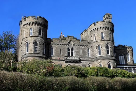 Historic English house with castle turrets, Scarborough, England.
