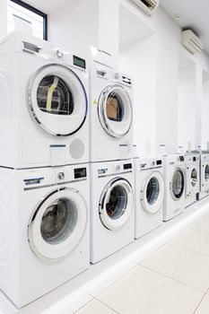 Washing machines, dryer and other domestic appliance equipment in the store