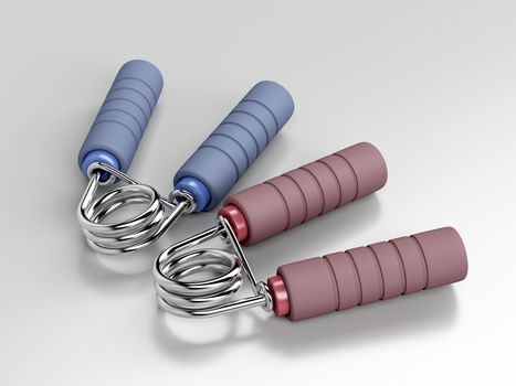 Pair of hand grippers on gray background 