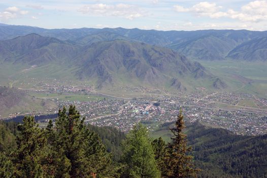 The Small village in valley between mountains.Type overhand