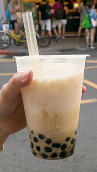 The tasty Taiwanese bubble tea drink (pearl milk tea) at food street market in Taipei, Taiwan.